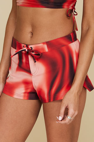 Quarter pose #1 of Trade Winds in Bahama Board Shorts