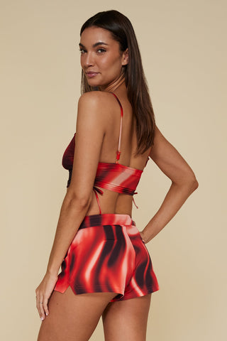 Oblique pose #1 of Trade Winds in Bahama Board Shorts paired with matching Auger Bralette Bikini Top