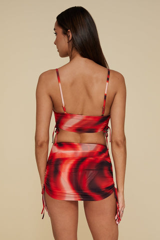 Back pose #1 of Trade Winds in Hadal High Waist paired with matching Auger Bralette Bikini Top